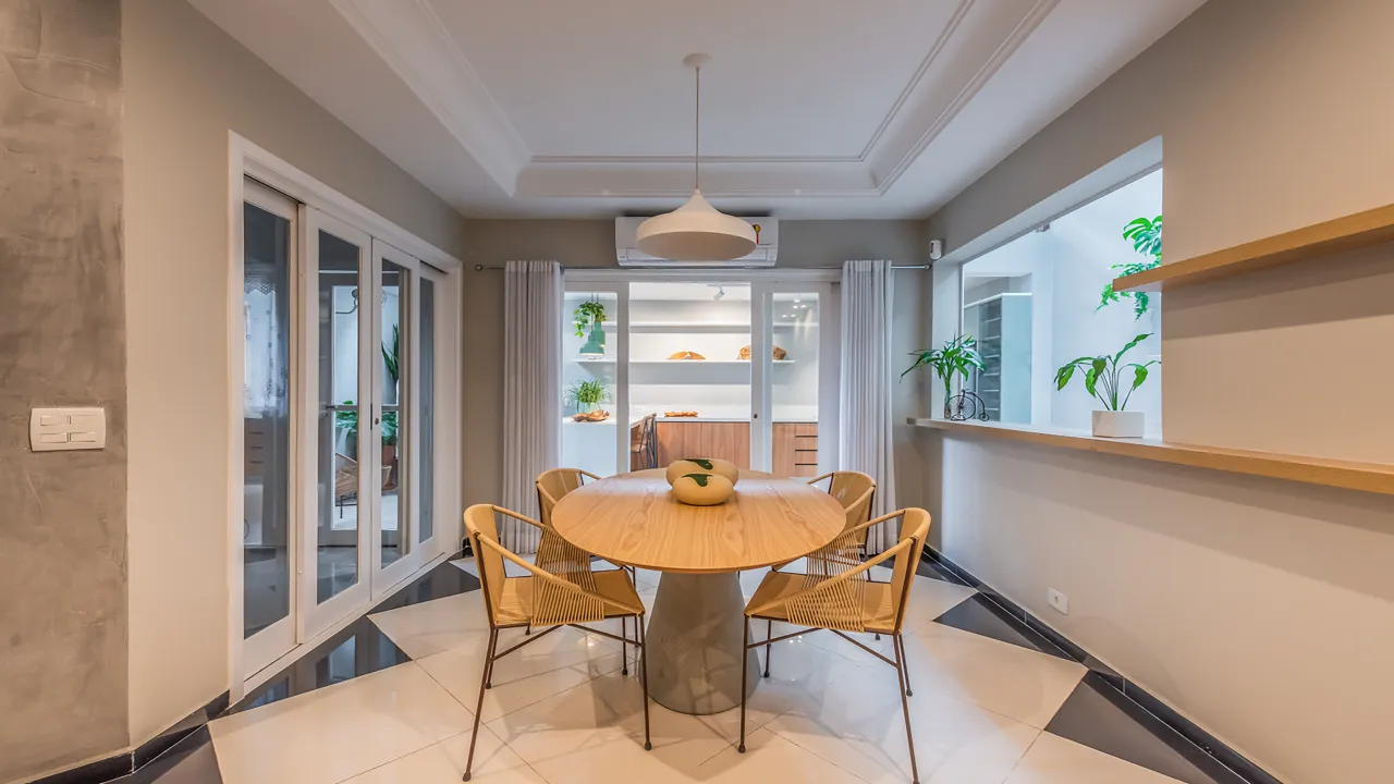 Sala de jantar integrada da Casa Praça com esquadrias sob medida